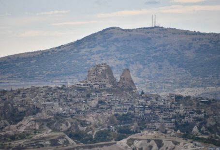 Hidden Treasures Cappadocia - a mountain with a city on top of it