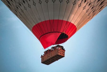 Cappadocia Hot Air Adventure - a large hot air balloon flying through a blue sky