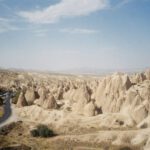 Cappadocia Underground - a rocky landscape with a road