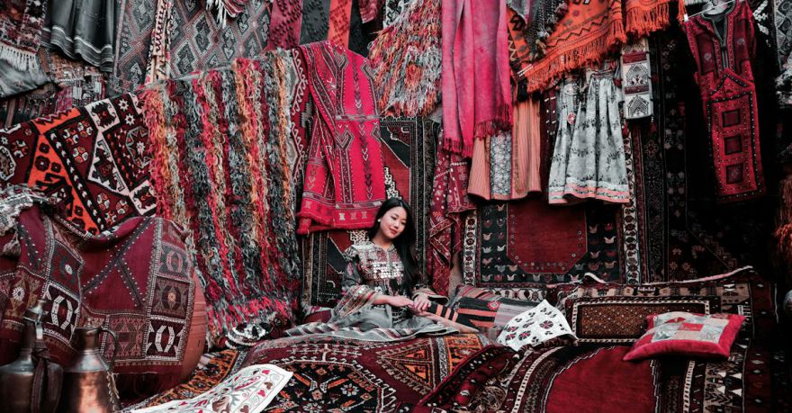 Souvenir Shopping Cappadocia - Woman Sitting on a Carpet
