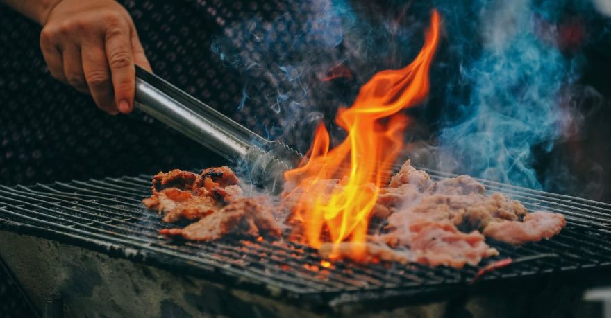 Grill Restaurants Cappadocia - Close-Up Photo of Man Cooking Meat