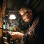 Stone Carving Workshop Cappadocia - man in black and white plaid dress shirt wearing black framed eyeglasses