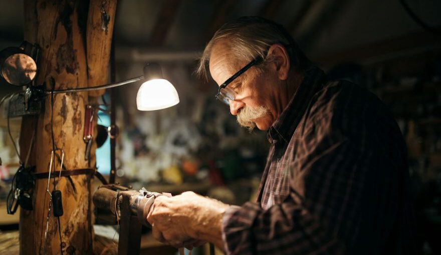 Stone Carving Workshop Cappadocia - man in black and white plaid dress shirt wearing black framed eyeglasses