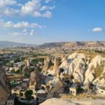 Sufi Legacy Cappadocia - a scenic view of a city in the mountains