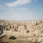 Award-winning Turkish Hospitality Accommodations Cappadocia - a rocky landscape with a road