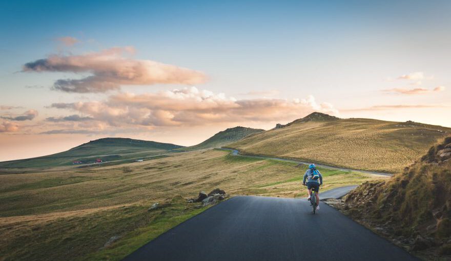 Cycling Tours Cappadocia - person cycling on road distance with mountain during daytime