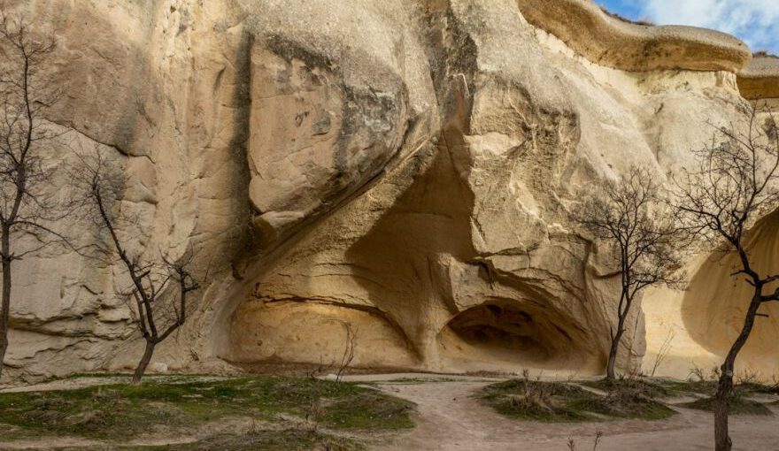 Christianity Influence Cappadocia - a large rock formation with trees growing out of it