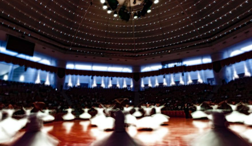 Whirling Dervishes Ceremony - low-angle photography of building