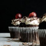 Dessert - three chocolate cupcakes with cherries