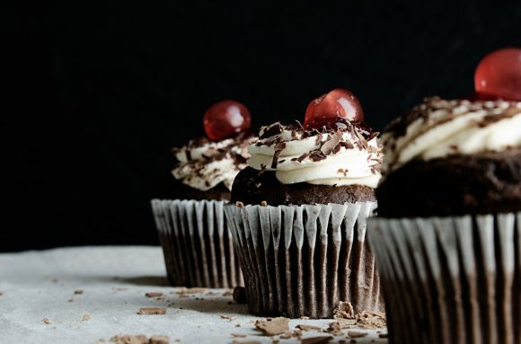 Dessert - three chocolate cupcakes with cherries