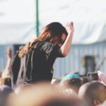 Festival - woman on top of crowd