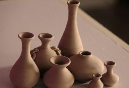 Pottery - white clay vases on table